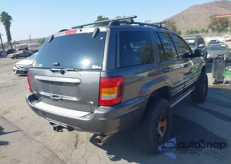 2003 Jeep Grand Cherokee Overland из США, поврежденный, VIN 1J8GW68J13C545620